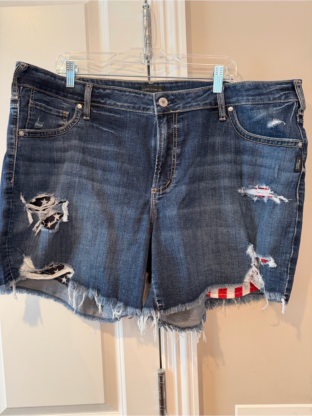 Silver Jeans Distressed Dark Blue Denim Shorts with Flag Patch